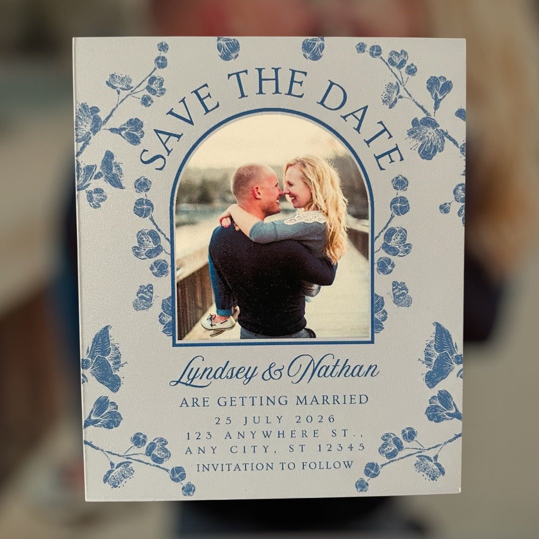Save the date card with a couple photo and floral chinoiserie design
