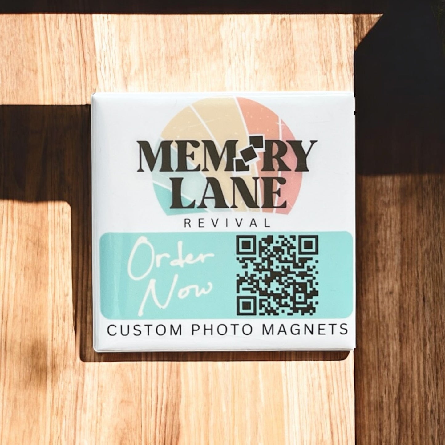 Packaging of Memory Lane Revival custom photo magnets on a wooden surface